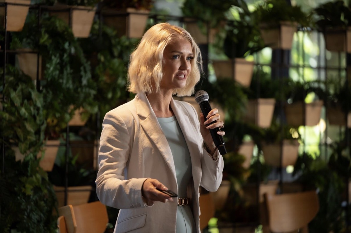 Carly Woods presenting an AI keynote at the Southern Gold Coast Chamber of Commerce in 2026